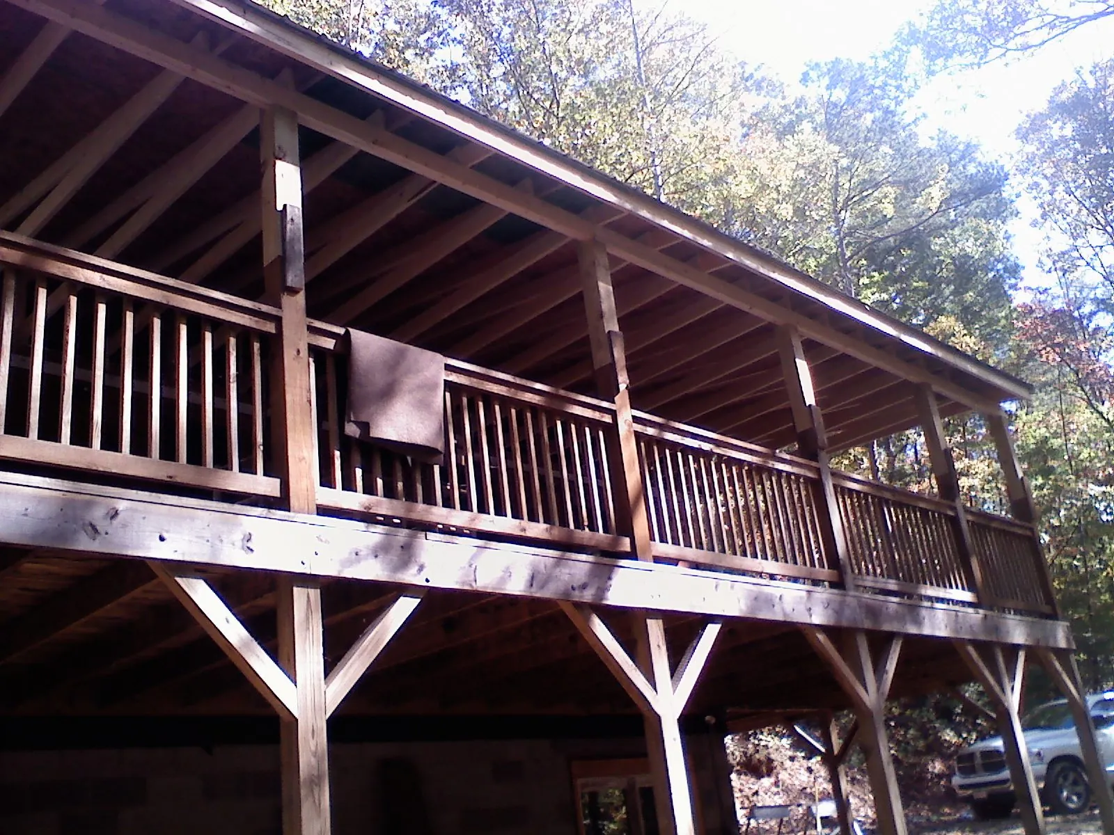 Timber framing under a new elevated porch and deck — Roof Leak Repair in Mcallen by Roofing Brothers